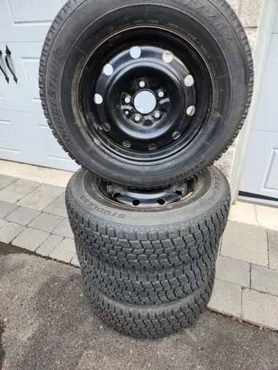 15" Bridgestone Blizzaks Winter tires 205/70R15 with rims. Rim bolt pattern is 5 x 114.3 Came off Ho...
