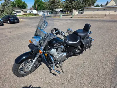 Lots of add on's: saddlebags, windshield, Mustang driver & passengers seat, Vance & Hines exhaust, h...