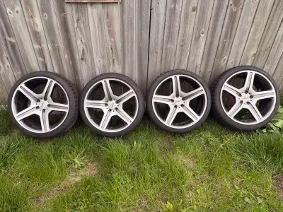 I am selling a set of four Sport Edition wheels paired with Bridgestone winter tires, sized 245/45R2...