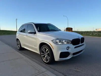 2014 BMW X5 xDrive50i M Sport Beautiful Alpine White Pearl BMW X5 with full M Sport package inside a...