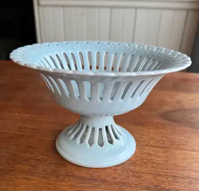 Pretty baby blue ceramic stand. Great condition
