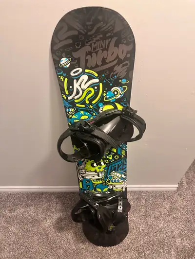 Mint condition used once K2 mini turbo youth snowboard 130cn board. Single strap design. light weigh...