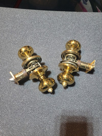 2 polished brass door handles with locks 