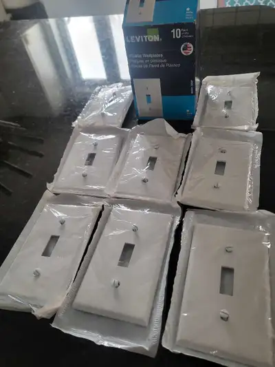New in packaging, Levuton white plastic wallplate light switch covers with hardware (screws) include...