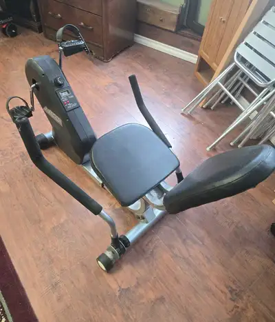 This is a Free Spirit recumbent exercise bike that features a digital display to track your vitals....