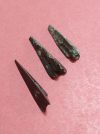 Three ancient arrowheads