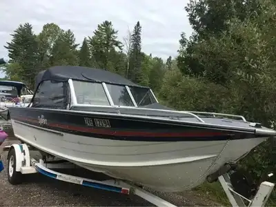 Bateau Sylvan 1987 18 pieds avec moteur Mercury 2 temps 75 forces 1993 avec trailer, raison de vente...