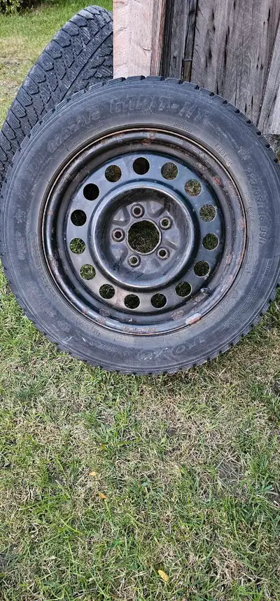 225/55-R16 Toyo Grit HT Barely used, great tread left. Rims are 5x115 Included snap-on hubcaps.