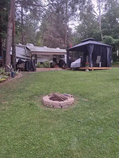 Selling ,2014 Laredo 27 ft, Couples trailer. On a beautiful lot at Castleton hills RV park , includi...