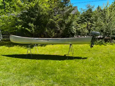 Great canoe with good running two stroke motor.