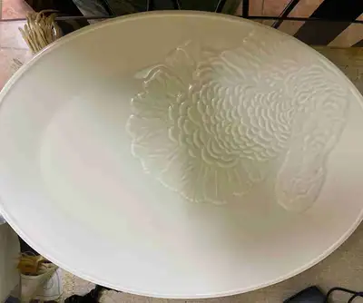Large turkey platter Image of turkey embossed on oval shaped platter. No scratches, only a very mino...