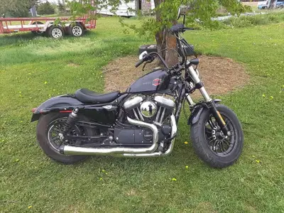 2019 Harley Sportster, low mileage. Stage one upgrade, Bassani Road Rage 2 into 1 exhaust, and an Ar...