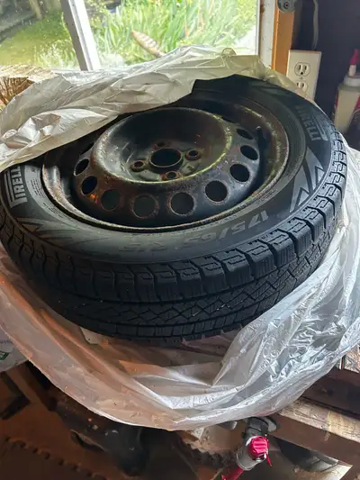 Set of 4 Pirelli winter tires, 175/65R15, mounted on steel rims. Used for only one season and in goo...