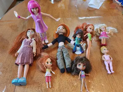 Variety of small dolls, View more