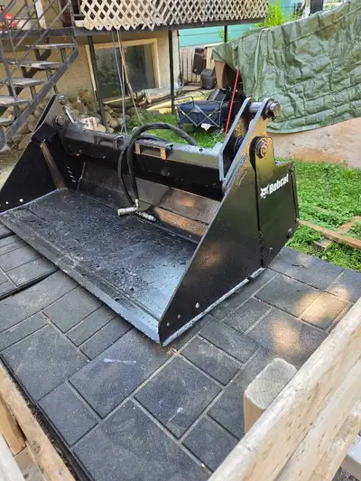 Refurbished Bobcat 68" Combo Bucket. In great working order.