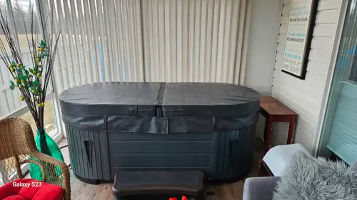 Two man hot tub was kept in a three season sunroom..and used only one season... this unit is sparkli...