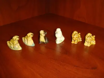 $10.00 each. Wade figurines. Sizes range from 1" x 1 1/2" x 1/2" to 2" x 1 1/2" x 3/4" Dogs. Hedgeho...