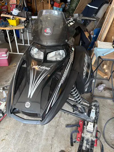 Parting out a 2005 rev 500ss. Top end on mag side blew a piston. All parts on machine still availabl...