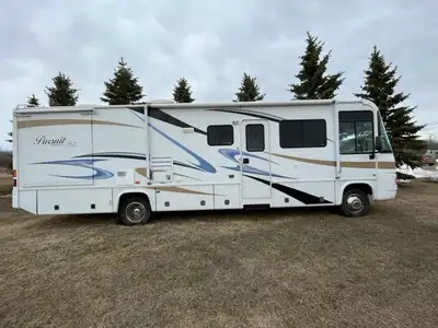 34 FT Class A Motorhome, 2 A/C units, 2 slides, new tire, entertainment system, 5500 Onan generator....
