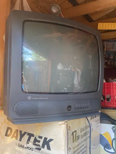 This GE 19-inch CRT television (model 19GT356TX1) is a classic piece of electronics from 1998, perfe...