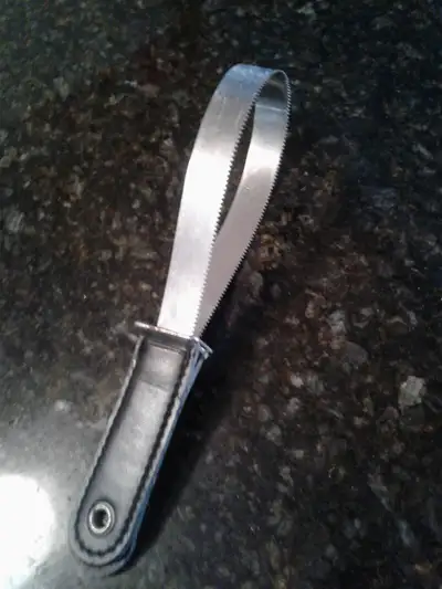 13'' LONG. LEATHER HANDLE. REST ALUMINUM