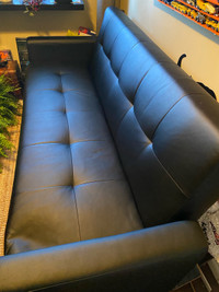  Black futon with underneath storage 