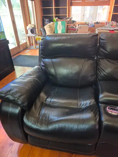 Black leather recliner, View more