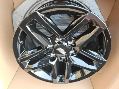 Brand new set of 4 Gloss black Oem rims with sensors and center caps. Never installed 6x139.7 bolt p...