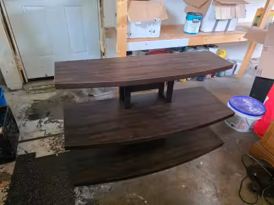 3 tiered TV stand, good condition but doesn't fit in my new place. Willing to deliver at extra cost...