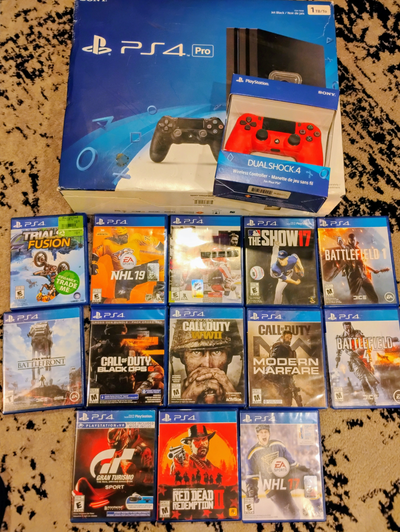 ps4 pro 1 tb used joy stick and new 1 in box & 13 games, View more