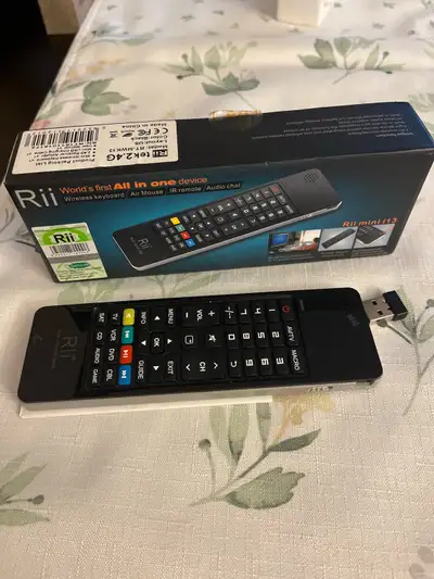 This is a used, with box Rii mini i13 wireless keyboard air mouse, perfect for controlling your smar...