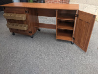 Wheeled, drop leaf expandable sewing or craft table