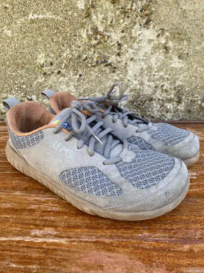 Get ready to experience natural movement with these used Lem's Primal 3 shoes, designed with a zero-...
