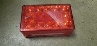 Westbar Left side LED trailer light.  Works perfect.  3.5" x 6"