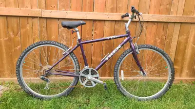 Small sized Trek bike. 26" tires with a small frame. Could fit a youth or small adult.