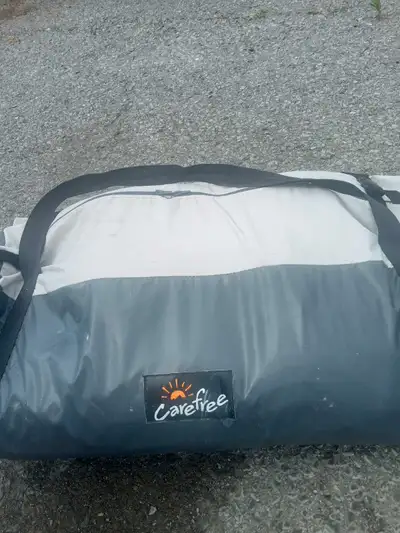 9'7" awning in pictures Likely fits up to 10' Came with our used camper but we travel camp so will n...