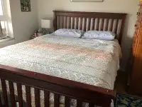 Solid wood bed frame with mattress and base