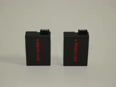 These two LP-E8 batteries are compatible with several Canon EOS Rebel DSLR cameras, specifically the...