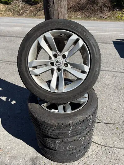 Summer tires & rims fit Nissan Altima , about 2 seasons left on the tires, Hercules tires. rims in g...