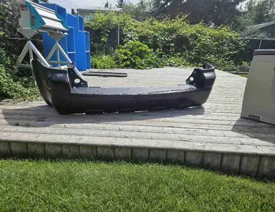 Rear bumper cover/panel for a 2012 Ford Escape. New, never been on a vehicle. Has been sitting in st...