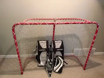 Hockey net and child goalie pads, View more