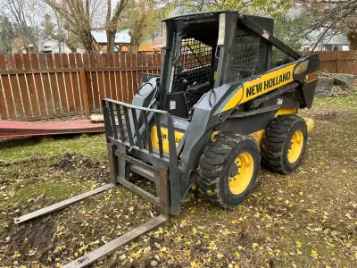 Grading landscaping excavating New holland L185 100 per hour. Experienced operator insured