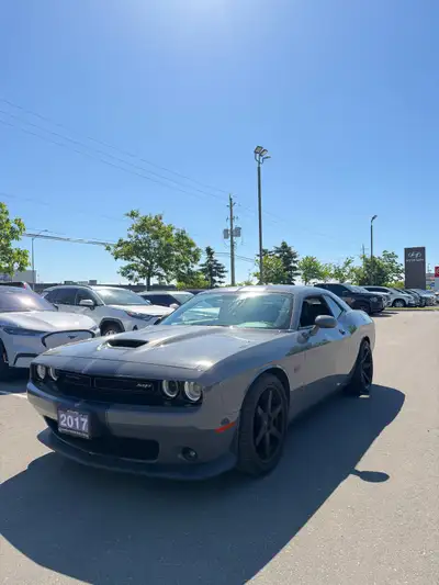 For sale is 2017 Dodge Challenger SRT 392 finished in Grey with Black Stripes. Powered by the legend...