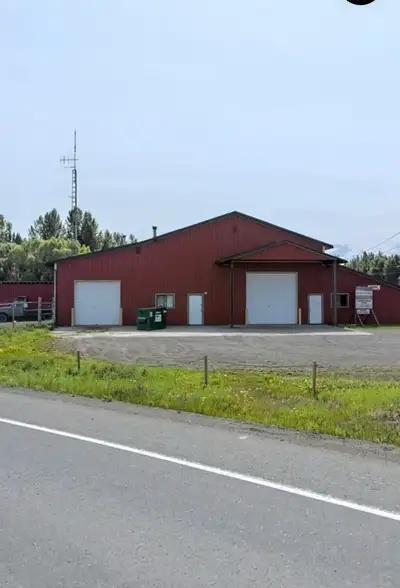 Heated 2900 square foot shop/warehouse space. 14 foot high bay door, 16 ft ceilings, security system...