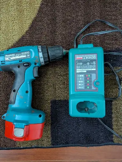 battery drill and box, View more