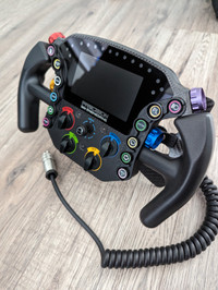 used sim racing wheel, pedals, and direct drive
