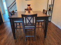 Dinning table with 8 chairs, and servery