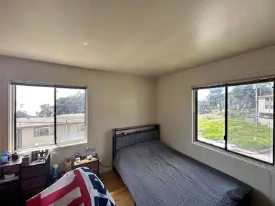 Bright and airy room for rent available in a shared home, featuring two large windows that provide p...