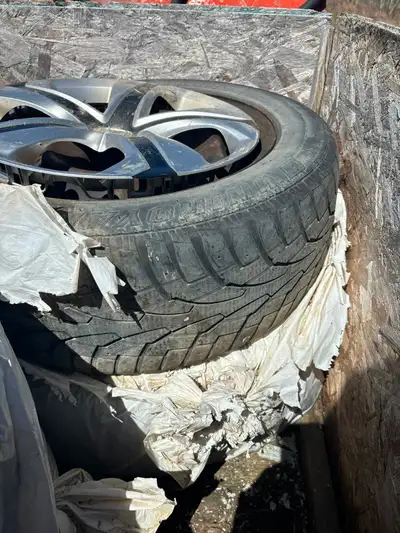 Used winter tires and rims, and 1 hub cap, tires are usable but the rims are in perfect shape, also...