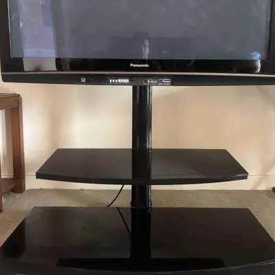 50 inch Panasonic TV and rotating stand/table, View more